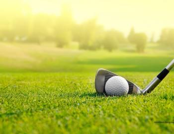 golfing in the lowcountry golf club hitting ball on the greens